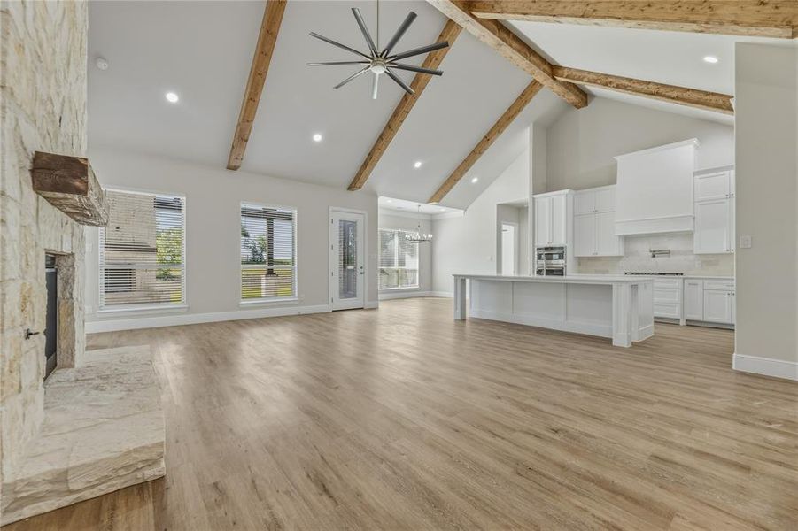 Beautiful luxury vinyl wood plank and vaulted ceiling. Spacious kitchen Beautiful luxury vinyl wood plank and vaulted ceiling. Spacious kitchen