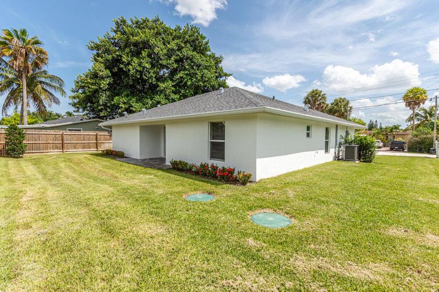 Front exterior of a new home in , West Palm Beach, FL, highlighting curb appeal (Image 12).