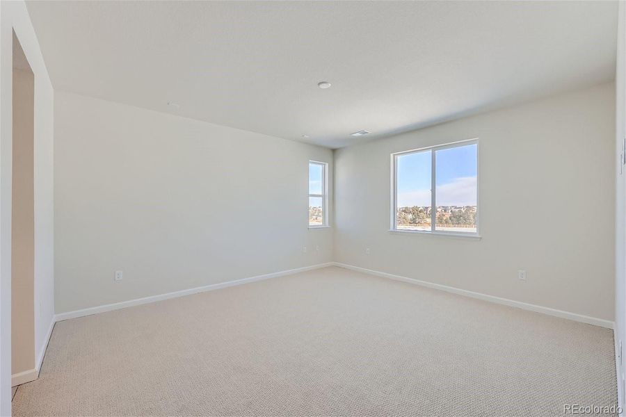 Spacious, unfurnished interior of a new home in Floret Collection at Parkdale Commons, Erie (Image 9).