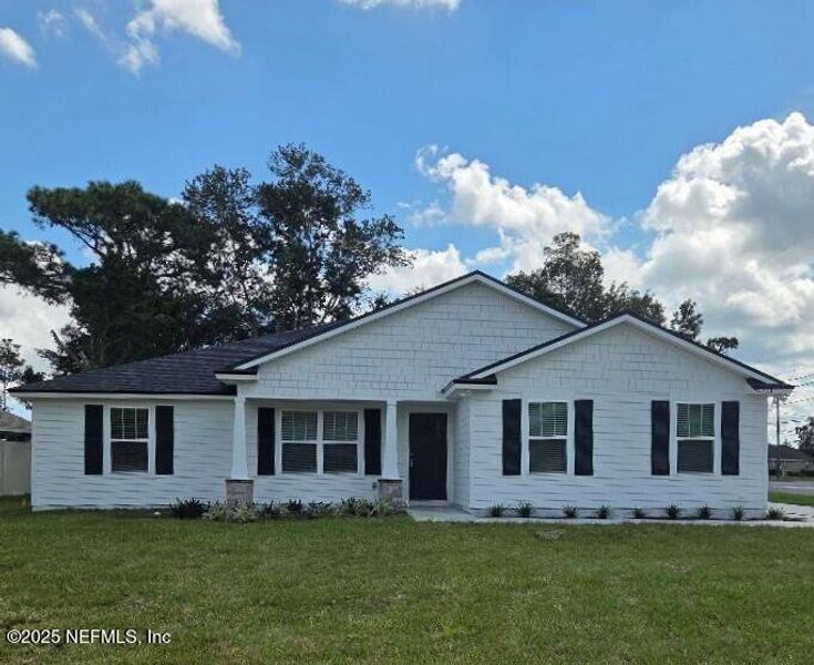 Front exterior of a new home in , Jacksonville, FL, highlighting curb appeal (Image 21). Front exterior of a new home in , Jacksonville, FL, highlighting curb appeal (Image 21).