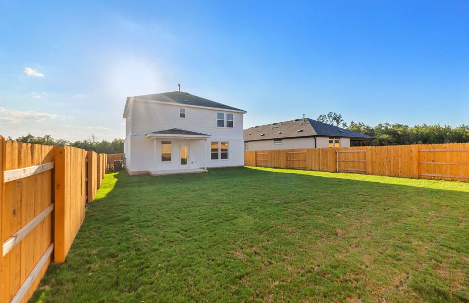 Exterior details and patio area of a home in Woodside, Georgetown (Image 26).