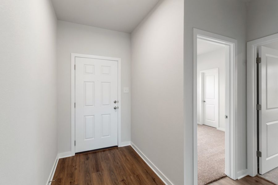Representative unfurnished interior of a home built from the Concho by Omega Builders in Hillside Village, Temple (Image 11). Representative unfurnished interior of a home built from the Concho by Omega Builders in Hillside Village, Temple (Image 11).