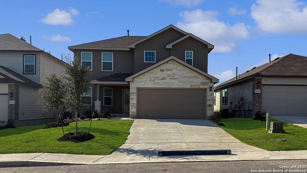 Front exterior of a new home in Langdon, San Antonio, TX, highlighting curb appeal (Image 1). Front exterior of a new home in Langdon, San Antonio, TX, highlighting curb appeal (Image 1).