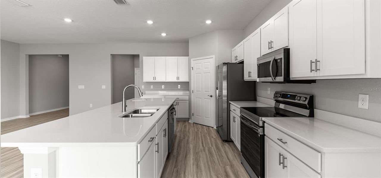 Furnished interior view inside a new home in Vista Trace, Belleview (Image 3).