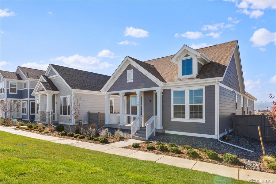 Front exterior of a new home in Westerly, Erie, CO, highlighting curb appeal (Image 1).