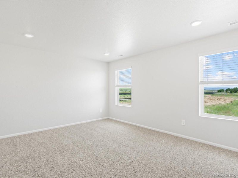 Spacious, unfurnished interior of a new home in Westgate, Greeley (Image 32).