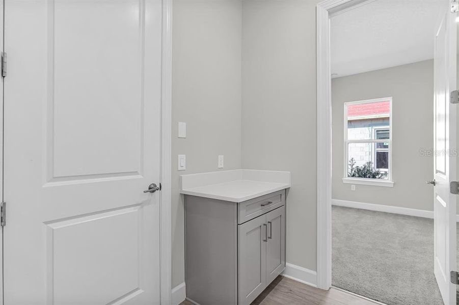 Furnished interior view inside a new home in Esplanade at Center Lake Ranch, St. Cloud (Image 8).