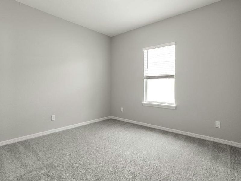 Secondary bedrooms provide space for everyone in your household.
