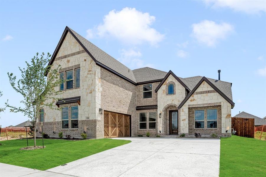 Front exterior of a new home in The Oaks, Red Oak, TX, highlighting curb appeal (Image 24). Front exterior of a new home in The Oaks, Red Oak, TX, highlighting curb appeal (Image 24).