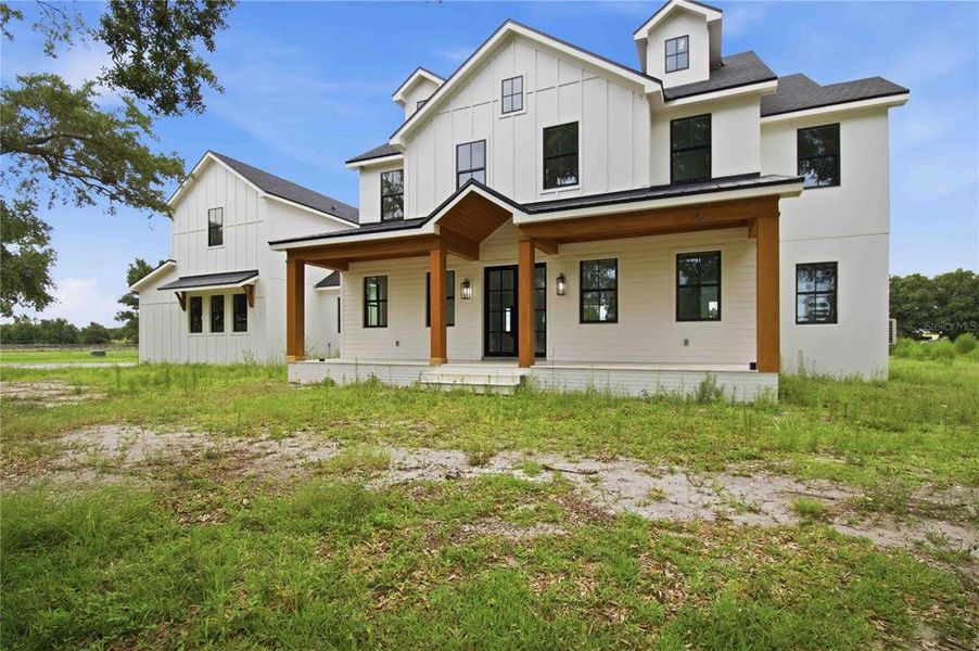 Exterior details and patio area of a home in , Sarasota (Image 6).