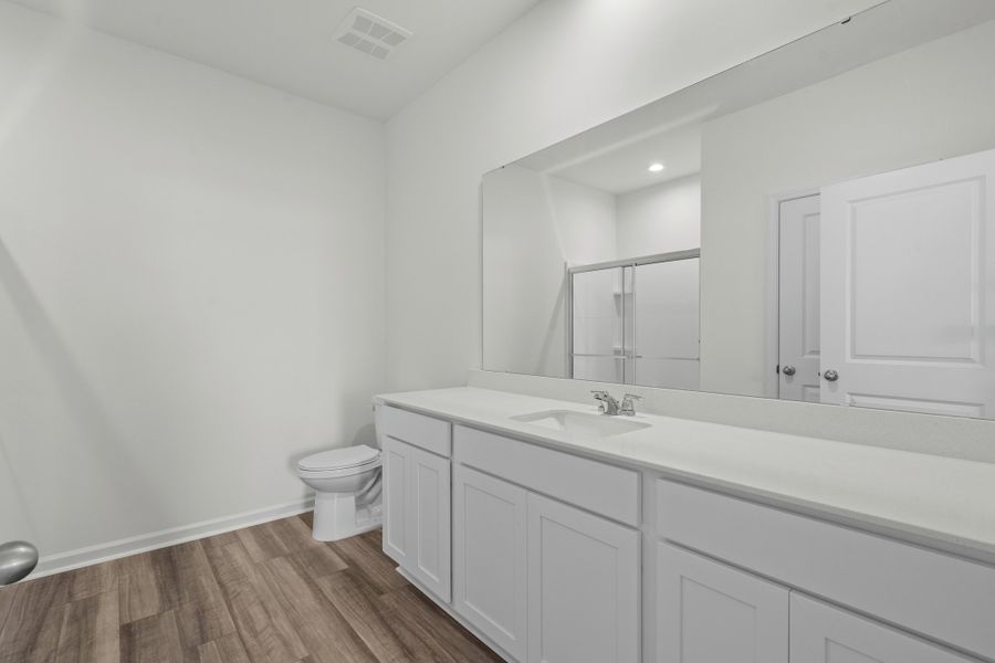 Representative furnished interior of a home built from the Europa by Starlight Homes in Andalusia, Loris (Image 14).