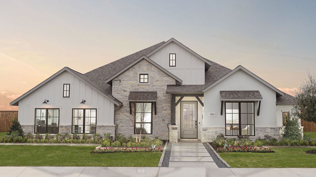 Front exterior of a new home in Parkside on the River West, Georgetown, TX, highlighting curb appeal (Image 19).