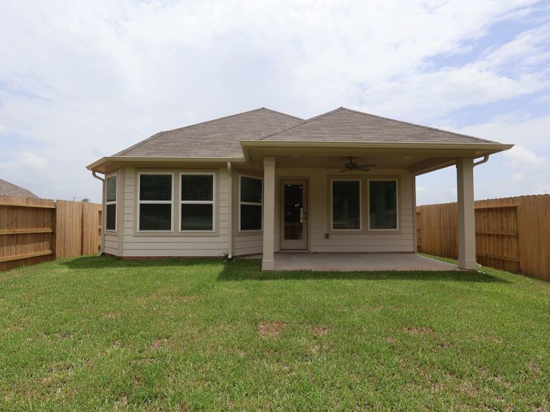 Exterior details and patio area of a home in Lone Star Landing, Montgomery (Image 21). Exterior details and patio area of a home in Lone Star Landing, Montgomery (Image 21).