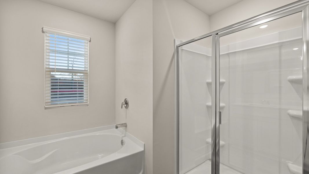Representative furnished interior of a home built from the Hayden by D.R. Horton in Brooks Station, Dacula (Image 12).