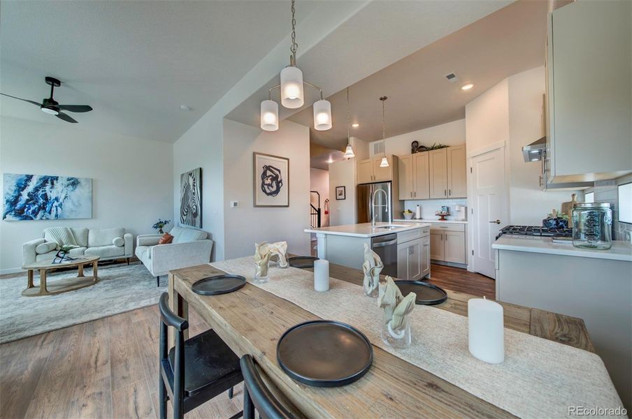 Dining area is adjacent to kitchen and living room.