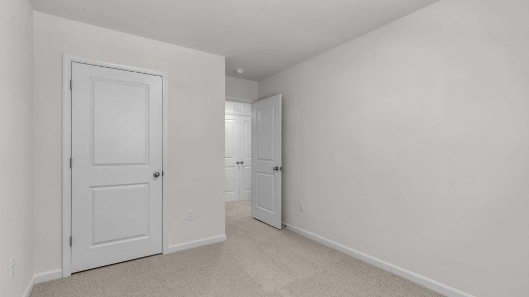 Spacious, unfurnished interior of a new home in The Townes at Bexford, Willow Spring (Image 17). Spacious, unfurnished interior of a new home in The Townes at Bexford, Willow Spring (Image 17).