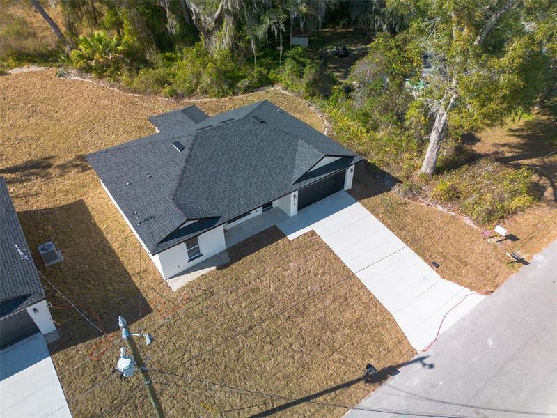 Front exterior of a new home in , Deland, FL, highlighting curb appeal (Image 14).