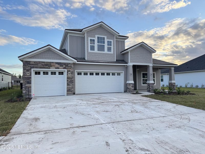 Front exterior of a new home in , Green Cove Springs, FL, highlighting curb appeal (Image 5). Front exterior of a new home in , Green Cove Springs, FL, highlighting curb appeal (Image 5).