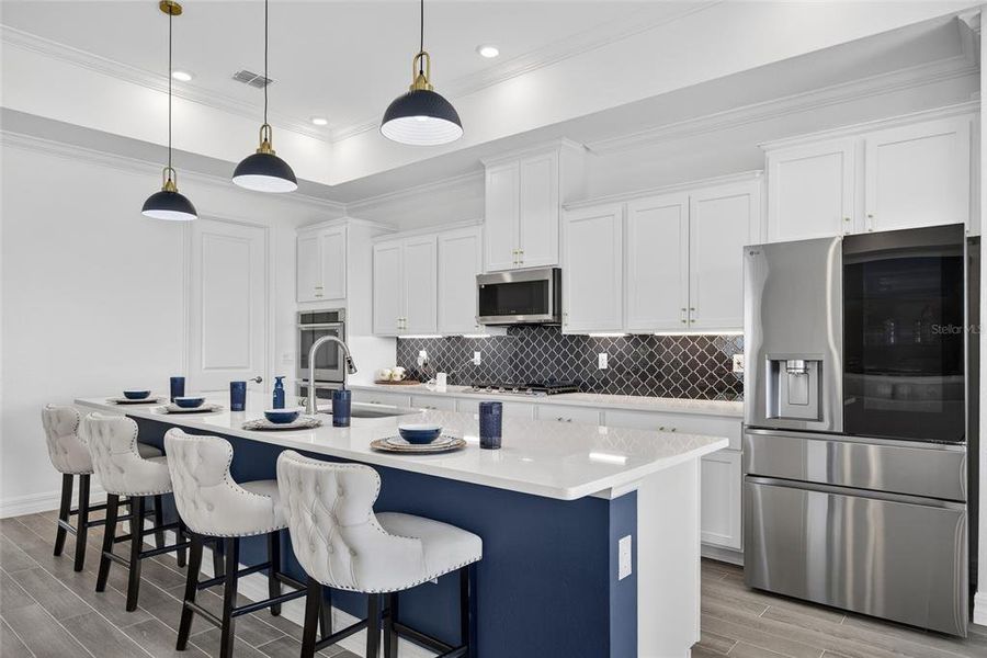 Furnished interior view inside a new home in Heritage Station, Punta Gorda (Image 11).