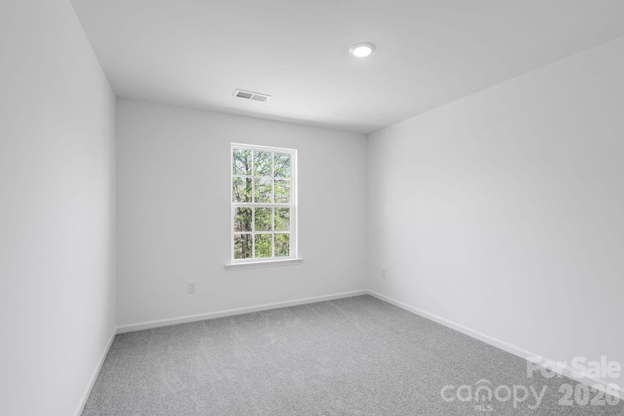 Spacious, unfurnished interior of a new home in Cannon Village, York (Image 8).