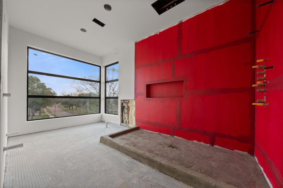Primary bathroom with dual vanities, expansive shower, stand alone tub and separate water closet.
