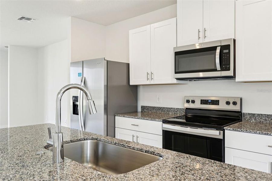 Furnished interior view inside a new home in Springs at Lake Alfred - Classic Series, Lake Alfred (Image 6).