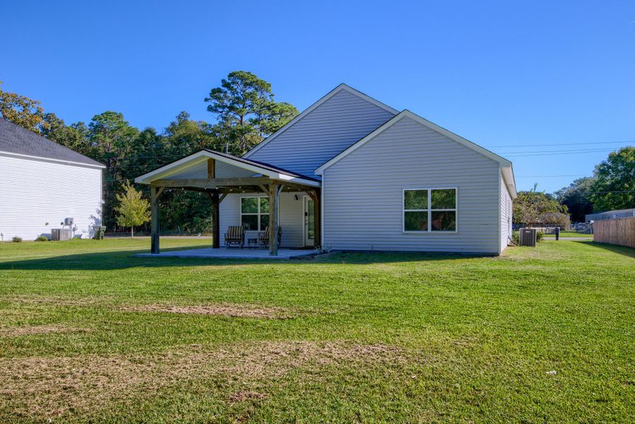 Exterior details and patio area of a home in , Bonneau (Image 26).
