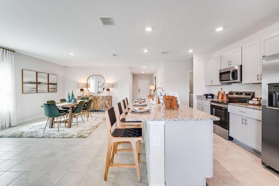 Furnished interior view inside a new home in Waterstone, Groveland (Image 11).