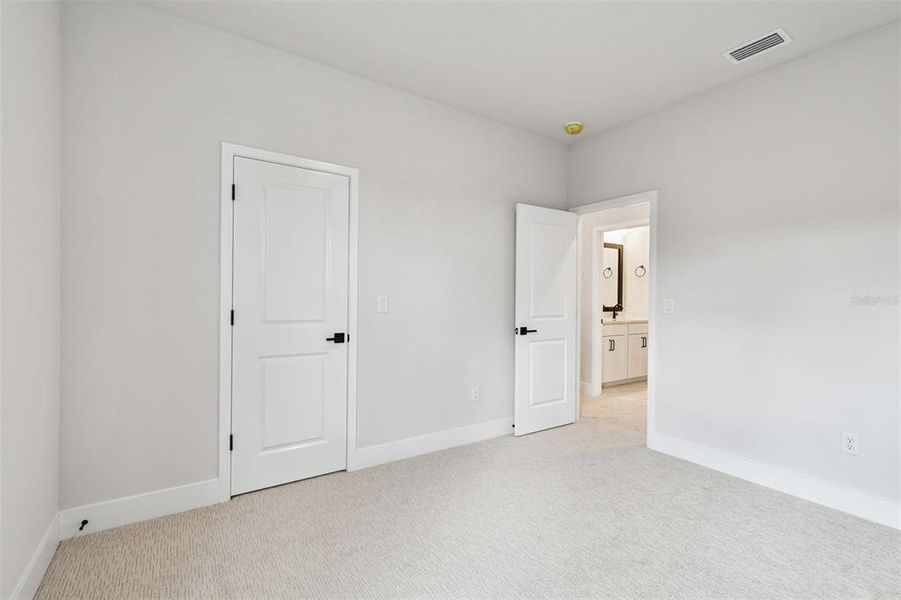 Spacious, unfurnished interior of a new home in Emerald Landing at Waterside at Lakewood Ranch – Lake Series, Sarasota (Image 17).