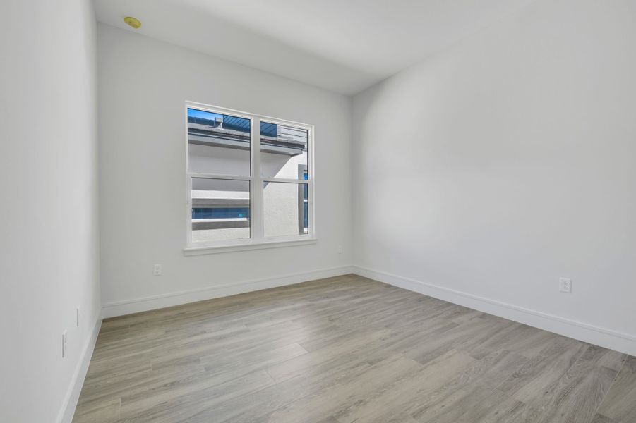 Representative unfurnished interior of a home built from the Marbella by ABD Development in Hampton Green at Providence, Davenport (Image 43).