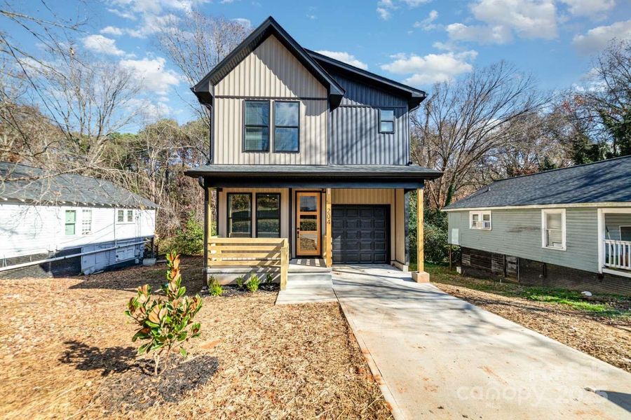 Front exterior of a new home in , Kannapolis, NC, highlighting curb appeal (Image 1). Front exterior of a new home in , Kannapolis, NC, highlighting curb appeal (Image 1).