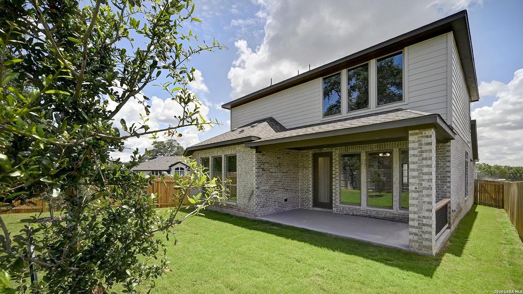 Exterior details and patio area of a home in Kallison Ranch, San Antonio (Image 24).
