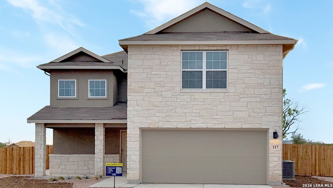 Front exterior of a new home in High Garden, Comfort, TX, highlighting curb appeal (Image 2). Front exterior of a new home in High Garden, Comfort, TX, highlighting curb appeal (Image 2).