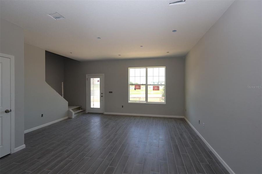 Spacious, unfurnished interior of a new home in Tribute at Ovation, Winter Garden (Image 19). Spacious, unfurnished interior of a new home in Tribute at Ovation, Winter Garden (Image 19).