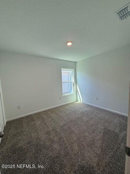 Spacious, unfurnished interior of a new home in Grand Reserve, Bunnell (Image 53).