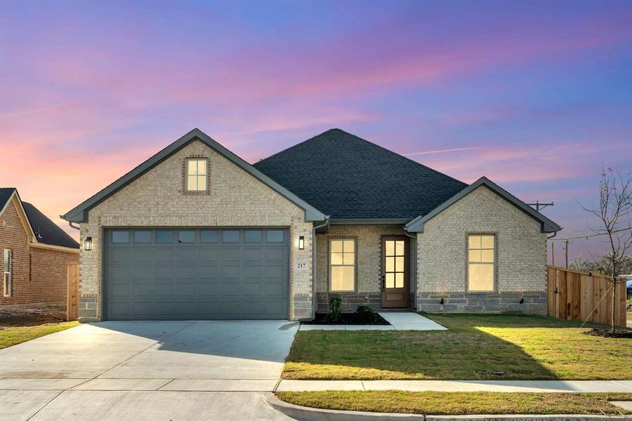 Front exterior of a new home in , Grand Prairie, TX, highlighting curb appeal (Image 22).