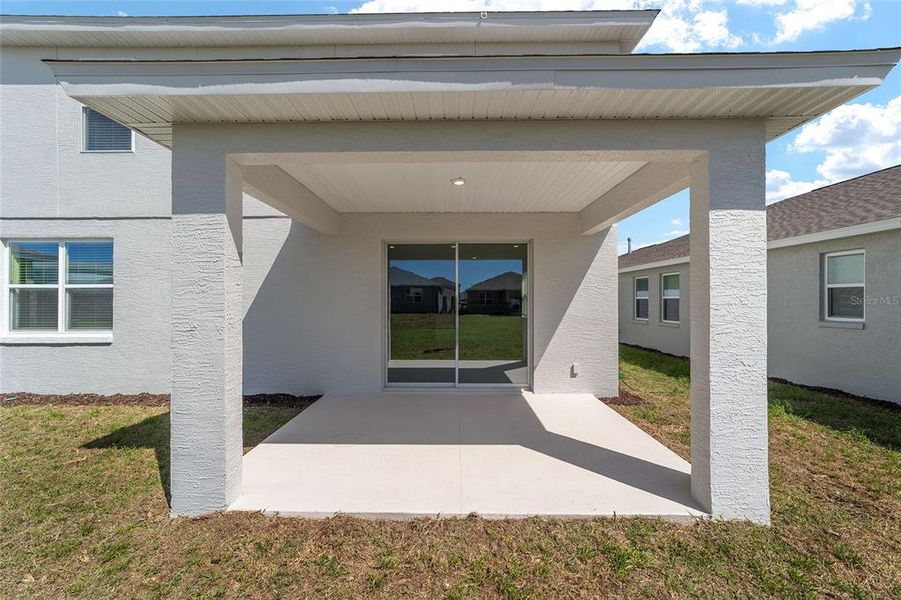 Exterior details and patio area of a home in Calesa Township, Ocala (Image 25).