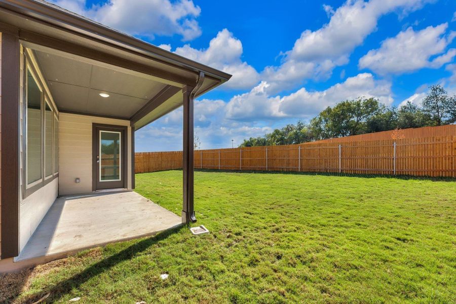 Exterior details and patio area of a home in Prairie Winds, Hutto (Image 3). Exterior details and patio area of a home in Prairie Winds, Hutto (Image 3).