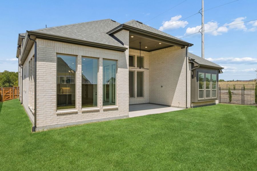 Exterior details and patio area of a home in The Parks at Wilson Creek, Celina (Image 4).