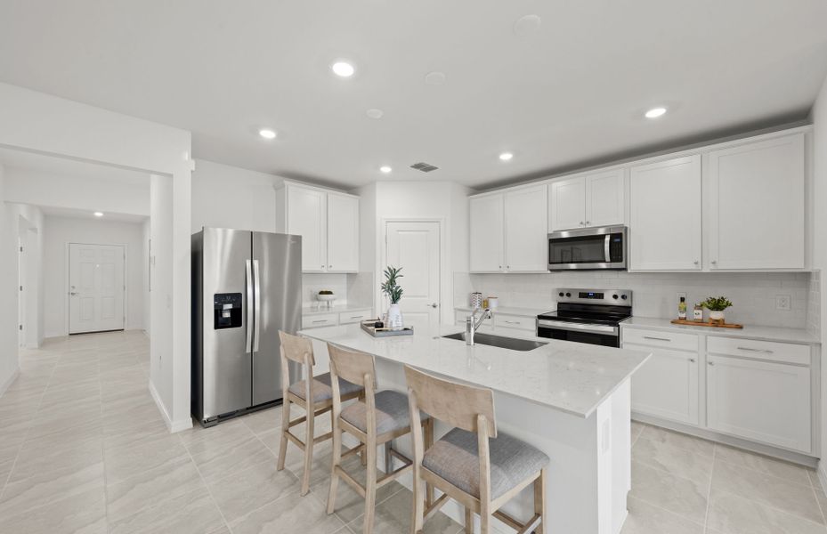 Furnished interior view inside a new home in Whispering Lakes, Lehigh Acres (Image 9).