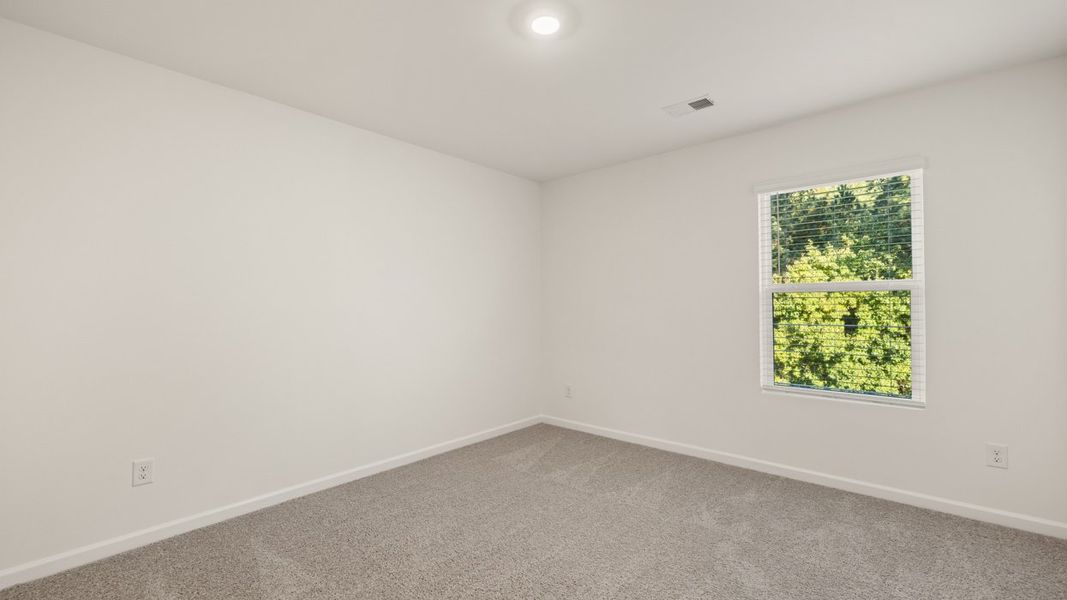 Representative unfurnished interior of a home built from the Galen by D.R. Horton in The Reserve at Calcutta, Stockbridge (Image 18).