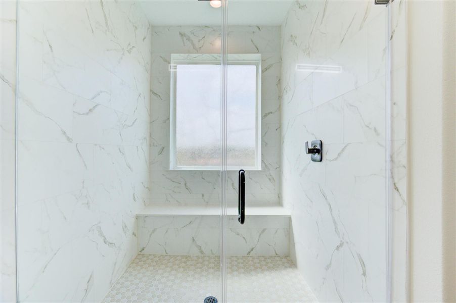 Large oversized shower with rain shower head and shower bench. Large oversized shower with rain shower head and shower bench.