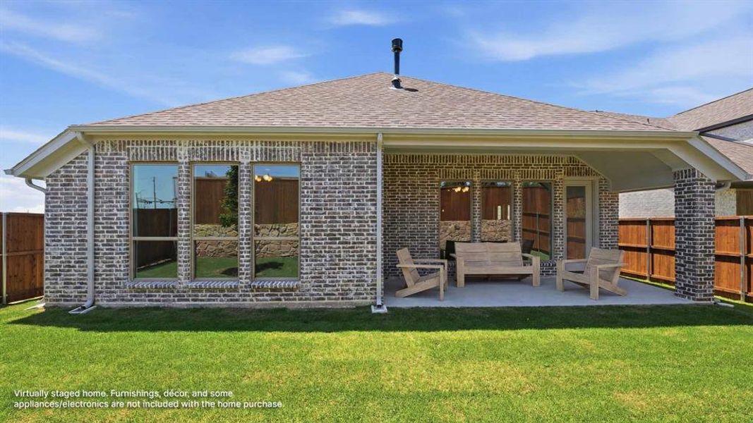 Exterior details and patio area of a home in The Heights at Uptown Celina, Celina (Image 3).