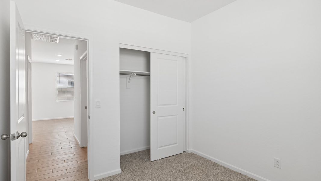 Spacious, unfurnished interior of a new home in Copper Falls, Buckeye (Image 20).