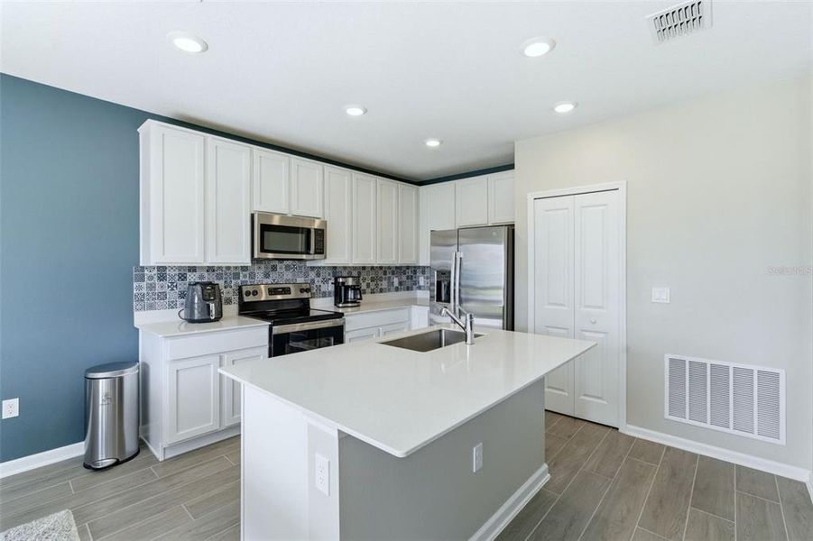 Furnished interior view inside a new home in Vineland Reserve, Osteen (Image 8).