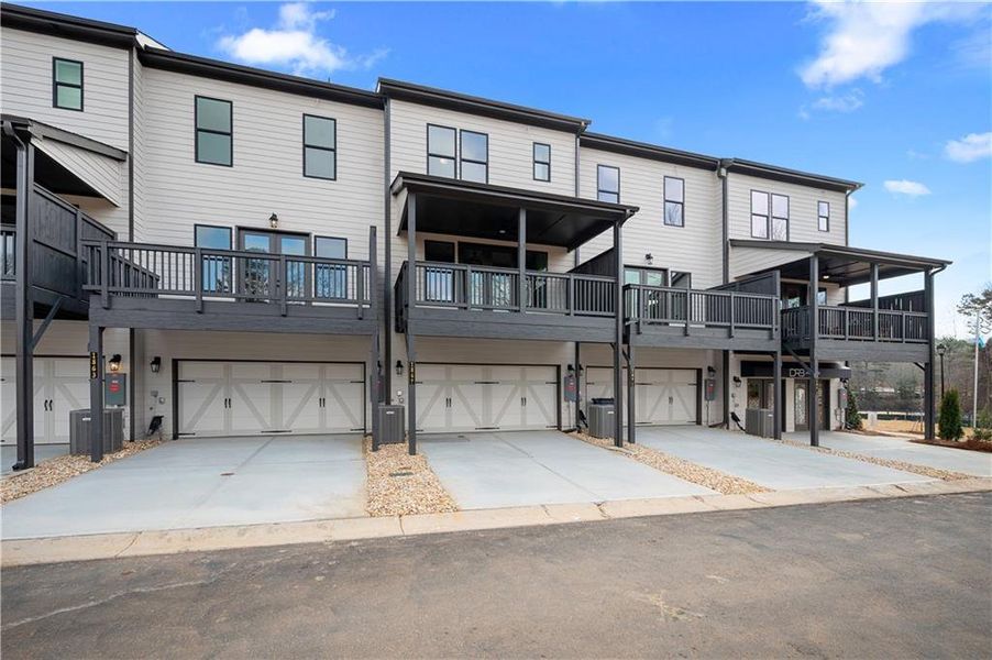 Front exterior of a new home in Barrett Pointe, Kennesaw, GA, highlighting curb appeal (Image 17).