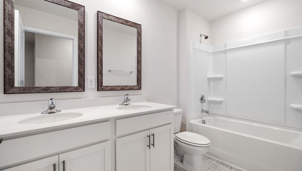 Representative furnished interior of a home built from the Elston by D.R. Horton in Varner Station, Woodruff (Image 13).