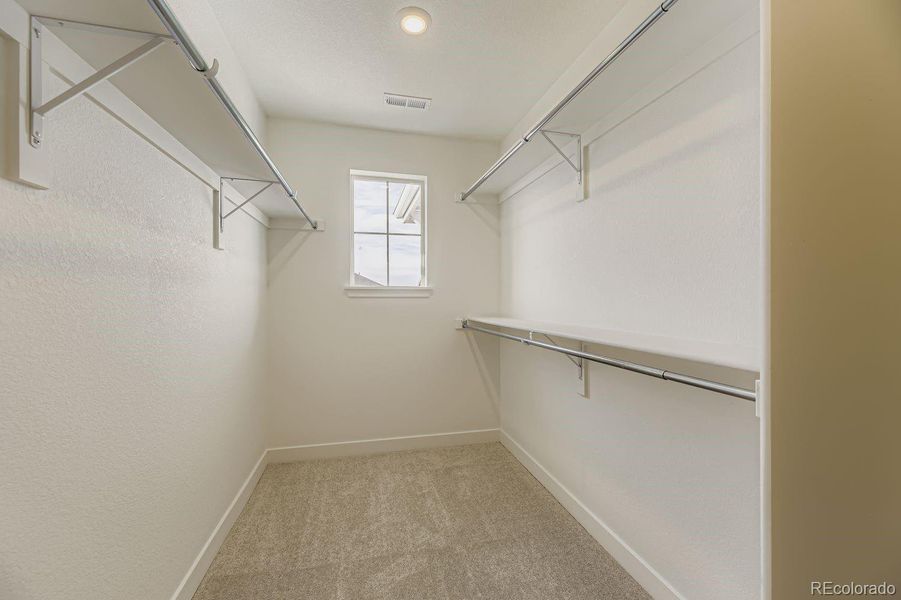 Spacious, unfurnished interior of a new home in Newlin Crossing: The Monarch Collection, Parker (Image 12).