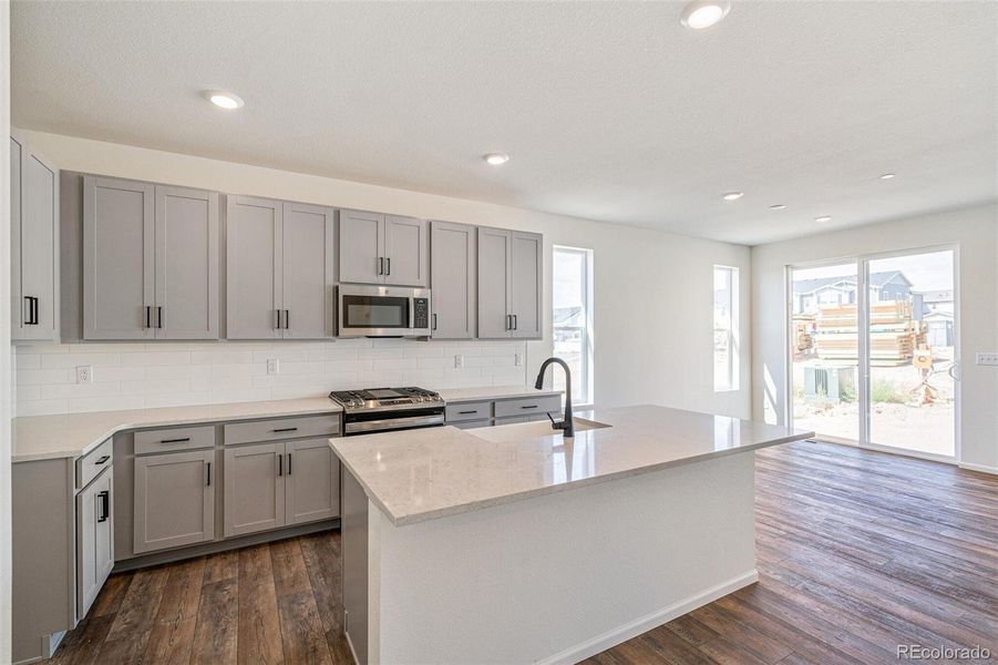 Furnished interior view inside a new home in Turnberry, Commerce City (Image 11).