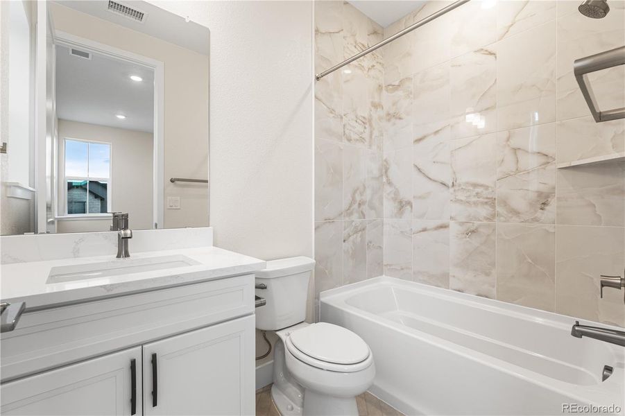 Furnished interior view inside a new home in Luxe at The Canyons, Castle Pines (Image 28).